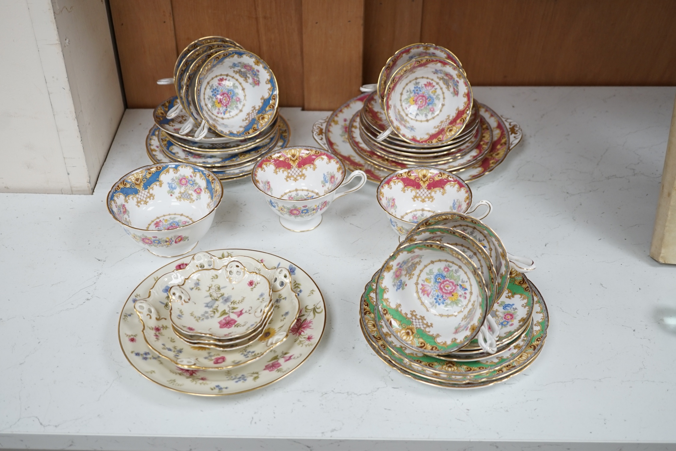 A Shelley harlequin part tea set in blue, green and pink, together with four Rosenthal dishes. Condition - good